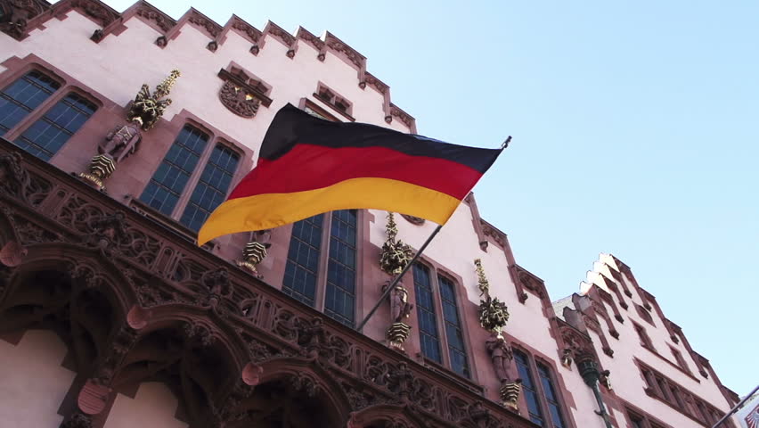 German flag floats in slow motion at the Frankfurt city hall
