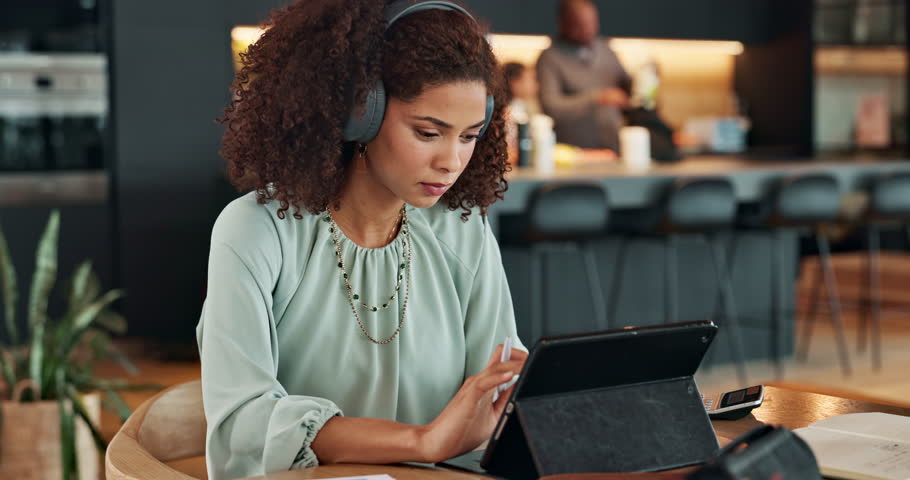 Tablet, research and woman with headphones in home office with online course for language learning. Writing, listening and freelance consultant with digital app for elearning, translation or notes