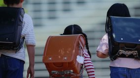 Elementary school student going to school friends - Powered by Shutterstock - Get 15% off with code: PIKWIZARD15