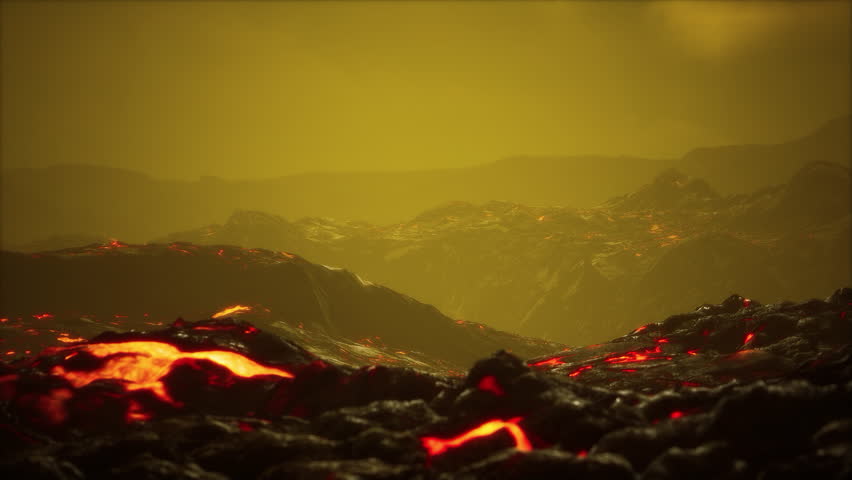 black lava field with hot red orangelavaflow at sunset