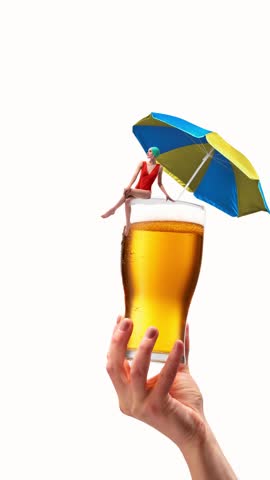 Elegant young woman in swimsuit sitting atop of glass with lager beer and umbrella, relaxing and sunbathing. Beach party. Stop motion, animation. Concept of summer, vacation, holiday, surrealism