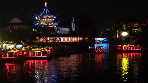 NANJING, CHINA - APRIL 30, 2012, Fast motion of Old town in Nanjing and Qinhuai River by night