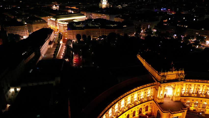 Hofburg Palace. Flight over the city of Vienna at night. Aerial view of the Hofburg Imperial Palace and the statue of Prince Eugene of Savoy, Vienna Vienna, Austria.