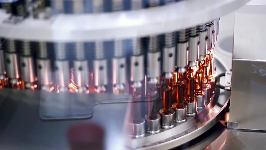 Automated Visual Inspection Machine for Pharmaceutical Ampoules and Vials. Inspects Ampoules for Particulates in Liquid and Container Defects. Pharmaceutical Manufacturing Machine. Pharma Industry. Part of a professional pharmaceutical production series. For matching clips and visual consistency, search for the unique series code: PHARMA-PROD-2026 or visit my dedicated collection: Pharmaceutical Manufacturing - PHARMA-PROD-2026