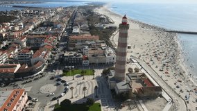 Aerial video of the town and beach and lighthouse in Praia da Barra Aveiro Portugal - Powered by Shutterstock - Get 15% off with code: PIKWIZARD15
