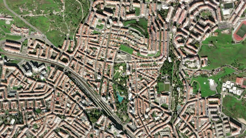 Zooming in and focusing on Amadora, Portugal frome space - Perfect for Travel Intros and Backgrounds. Realistic 3D Animation.