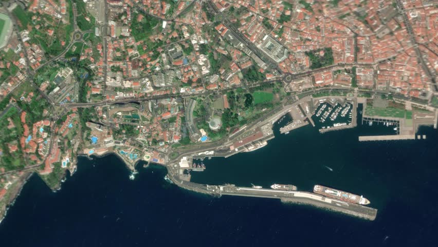 Zooming in and focusing on Funchal, Portugal frome space - Perfect for Travel Intros and Backgrounds. Realistic 3D Animation.
