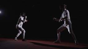 Fight Of Rivals On Fencing Track, Professional Fencers Fighting With Foils, Training Or Match - Powered by Shutterstock - Get 15% off with code: PIKWIZARD15