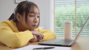 Asia people young woman study hard brownout bored remote work coding online read data tired sitting lying down at home desk think worry in career job tough stress workforce mental health issue illness - Powered by Shutterstock - Get 15% off with code: PIKWIZARD15