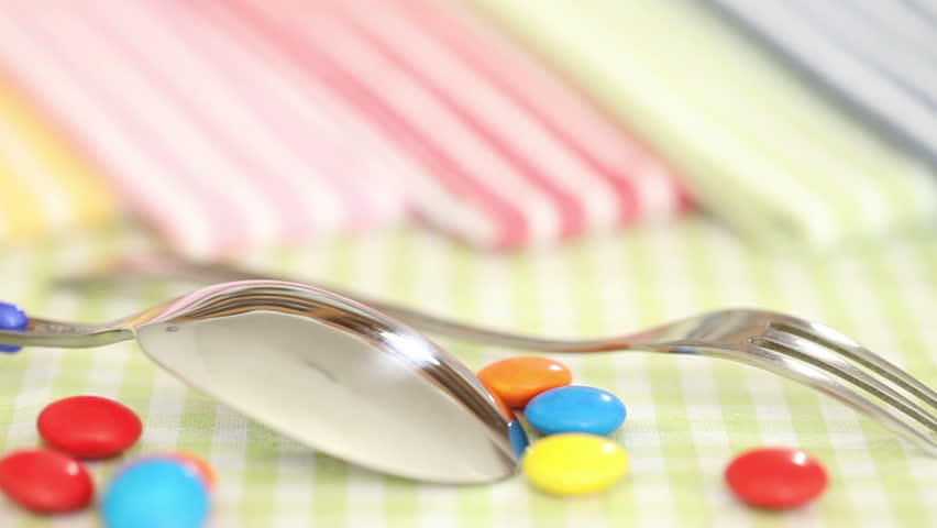 Tableware and candy on the kitchen table