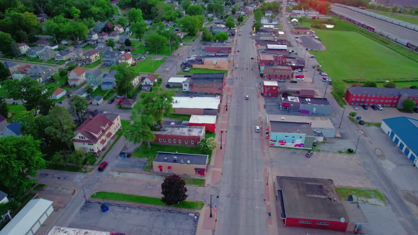Beautiful Sunset Aerial Over Main Street in Silvis, Illinois - Charming Small Town Americana in the Heart of the Midwest. Aerial view.