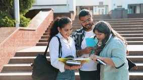 Group of students outdoors studying, preparing for exams - Powered by Shutterstock - Get 15% off with code: PIKWIZARD15