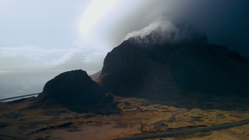 Scenic view of cloud-cover over mountains in Iceland