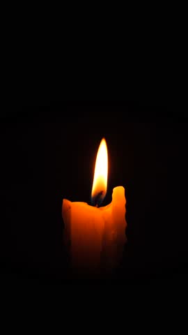 Burning Candle Wick Flame Blowing Out High Quality 4K Slow Motion Close-Up Macro Vertical Footage. Memorial Religious Romance Concept Dark Background.