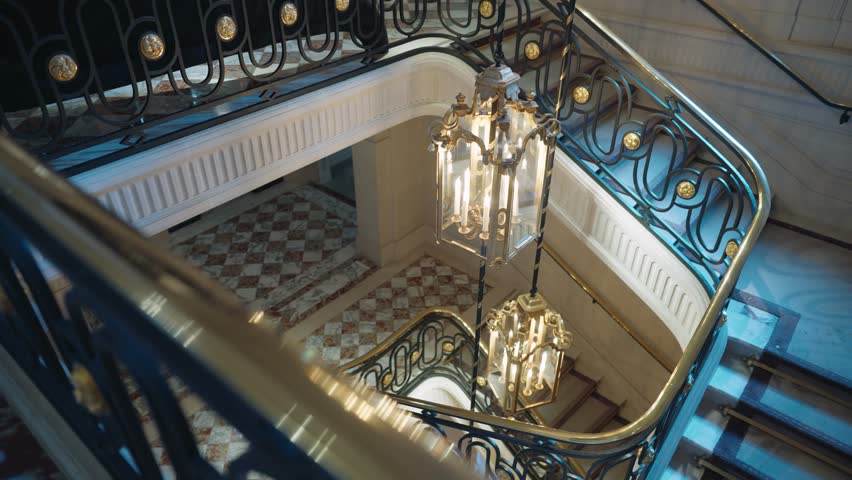 Establish staircase at luxury hotel in Paris, interior vintage gold decorations