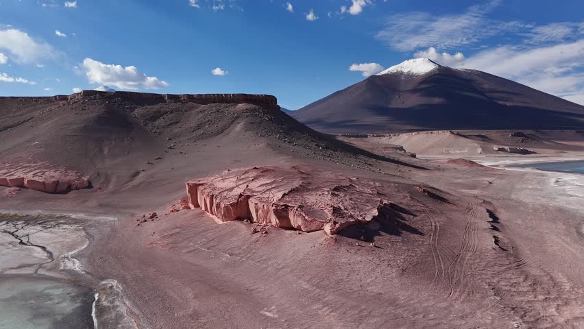 Aerial view of land near dormant Ojos del Salado volcano South America majestic nature. Bird's-eye view terrain by Ojos del Salado volcano South America grandeur environment of Chilean volcanic area