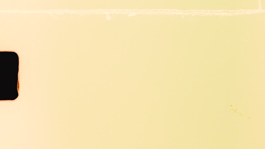 Super 8mm vintage film of Sentosa Island Siloso harbour beachfront with palm trees sand sea ocean with ships Singapore city Asia travel tourism holidays