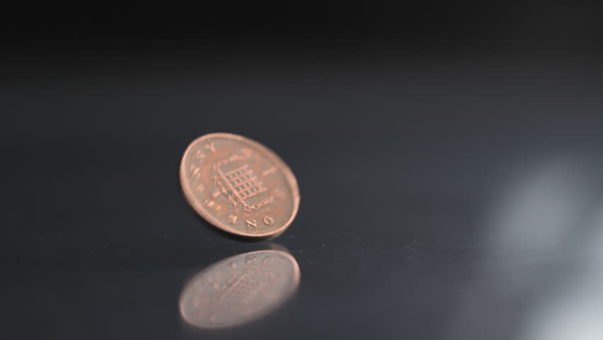 One Penny coin rotating slow motion, 0,01 £