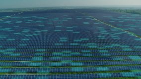Aerial view of a solar panels farm with animated energy lines, showcasing renewable green energy production. Animation with VFX graphics visualizing energy generation. - Powered by Shutterstock - Get 15% off with code: PIKWIZARD15