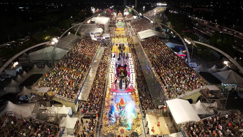 Carnival Ride At Sao Paulo Brazil. Famous Carnival Sambadrome Landscape Viewed From Above. Night Avenue Downtown Cityscape. Night Exterior Downtown Building Cities Of The World. Sao Paulo Brazil.
