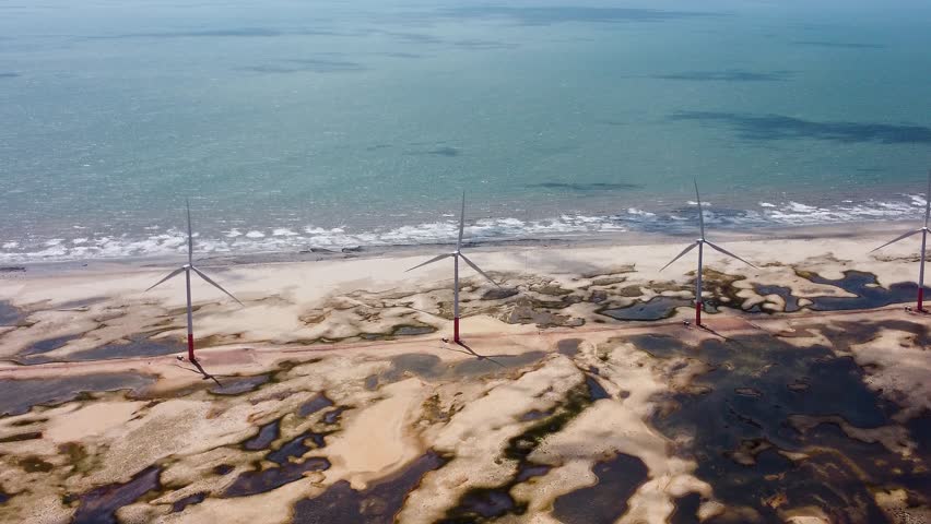 Wind Turbines Park At Lencois Maranhenses Maranhao Brazil. Deserted Landscape Idyllic Beauty Background. Deserted Summertime Idyllic Water Edge. Lencois Maranhenses Maranhao.