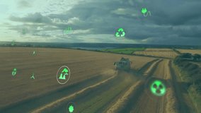 Agricultural field with combine harvester, sustainability icons animation over landscape. Agriculture, farming, environment, harvesting, technology, innovation - Powered by Shutterstock - Get 15% off with code: PIKWIZARD15