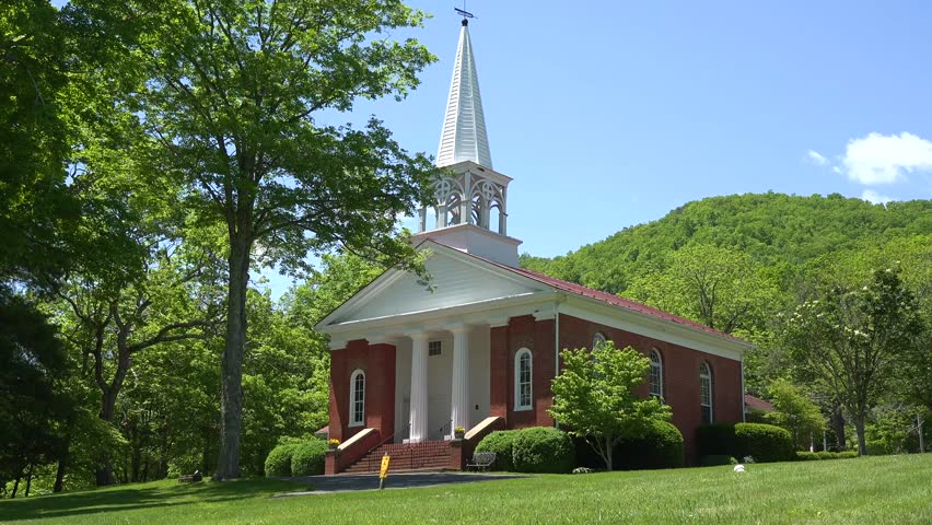 Usa - 7.5.2024 - exteriors of a southern baptist church in the rural american south.