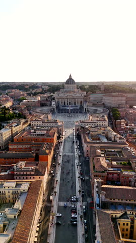 Aerial shot of the dwarf Vatican City state in Rome, Italy. Drone view of Saint Peter Basilica in Vatican State. Vertical video