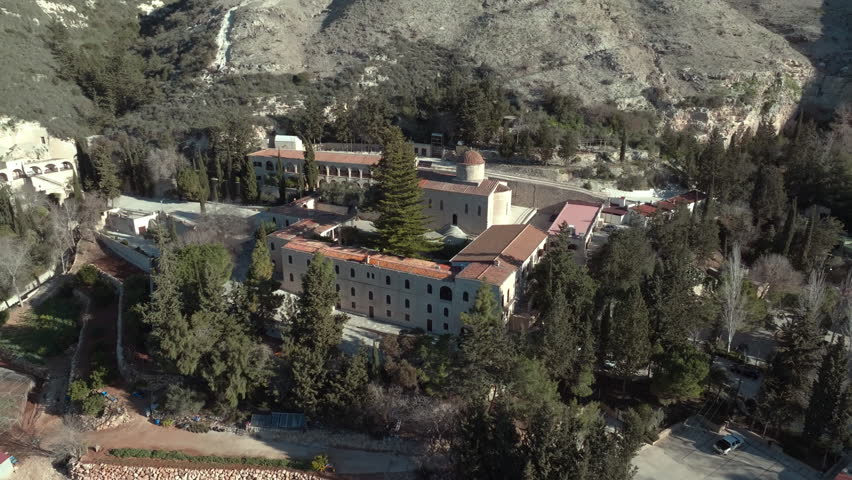 Drone View of Neophytos Monastery in Cyprus - Architectural Marvel of a Historical Church and Ancient Structures in a Mountain Setting. High quality 4k footage