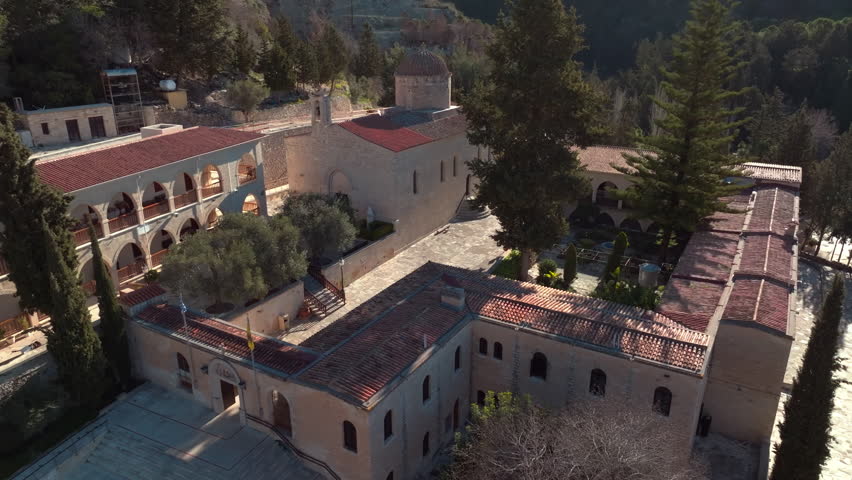 Aerial view Neophytos Monastery in Cyprus. The architecture of the church in the mountains with beautiful old historical buildings. High quality 4k footage