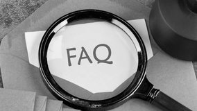 Question and Answer concept. The appearance of text FAQ through a magnifying glass on a white sheet - Powered by Shutterstock - Get 15% off with code: PIKWIZARD15