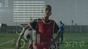 Soccer player holding ball with data visualization animation over field background. Sports, athlete, technology, digital, innovation, analysis - Powered by Shutterstock - Get 15% off with code: PIKWIZARD15