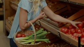 Stock market data animation over woman shopping for fruits in grocery store. Finance, economy, supermarket, groceries, investment, trading - Powered by Shutterstock - Get 15% off with code: PIKWIZARD15
