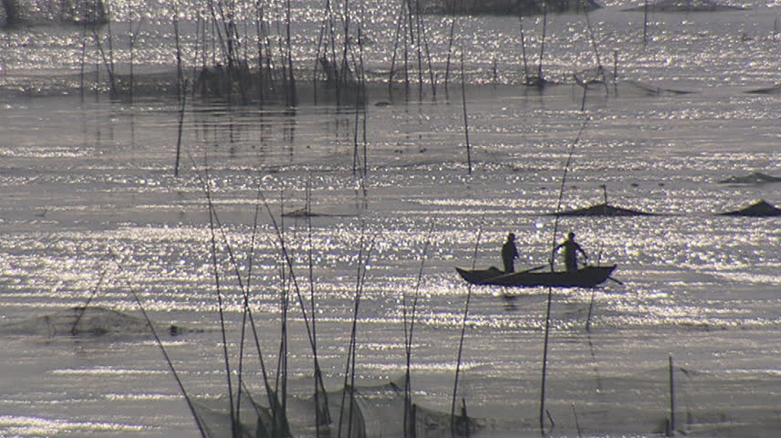 Fishermen in river