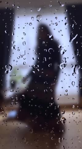 Dancing doll in the rainfall 