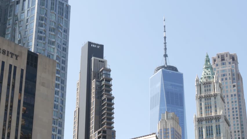 New York City Lower Manhattan, Downtown Financial District architecture, United States. One World Trade Center skyscraper Woolworth building, USA. American urban skyline. WTC Freedom tower in NYC.