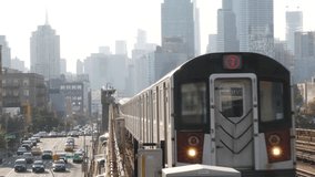 New York subway station. Metro train, metropolitan platform, United States public transportation. Elevated outdoor railway, 7 line, Queens. NYC passenger railroad traffic. Manhattan, Empire State view - Powered by Shutterstock - Get 15% off with code: PIKWIZARD15