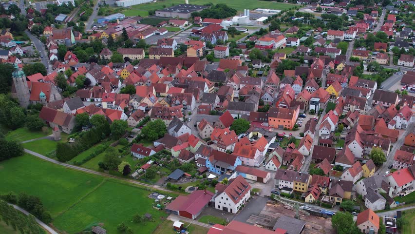 Aerial view around the old town of the city Markt Erlbach on a cloudy day in Germany.	
