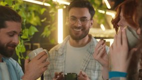 Multiethnic team business men women diverse girls guys colleagues friends coworkers students happy buddies drink coffee together office break talk friendly conversation male female group laughing fun - Powered by Shutterstock - Get 15% off with code: PIKWIZARD15