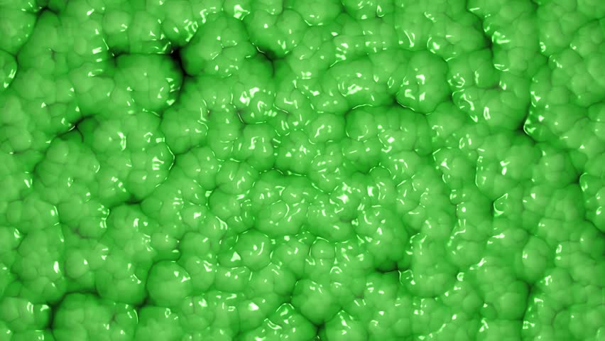 Vibrant oozing green slime abstract background. Microscopic view of an organic cellular structure pattern. Alien organism or texture concept. Full HD and looping motion background.