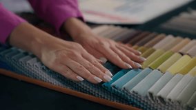 Close up hands woman girl touch soft fabric samples choose select cloth colorful palette design accessories female fashion designer tailor customer arms choosing color textile buying in atelier shop - Powered by Shutterstock - Get 15% off with code: PIKWIZARD15