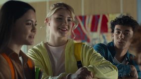 University back to school teens pupils students people girls guys boys female male four friends talking friendly conversation speaking smiling laughing talk communication studying education teenagers - Powered by Shutterstock - Get 15% off with code: PIKWIZARD15