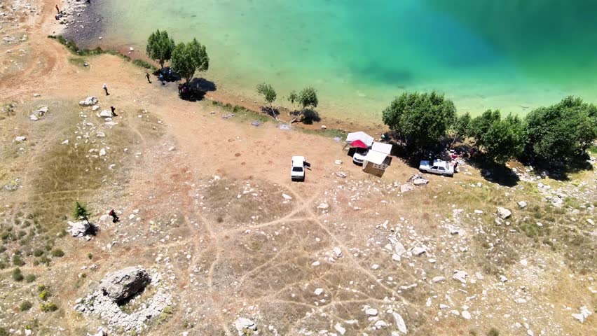The aerial views of Green Lake, a crater lake, is on the Gömbe Plateau, famous for its unique geographical riches.