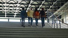 University back to high school academy college pupils students people girls guys boys women female male men classmates friends four teenagers climb up walking going stairs together education studying - Powered by Shutterstock - Get 15% off with code: PIKWIZARD15
