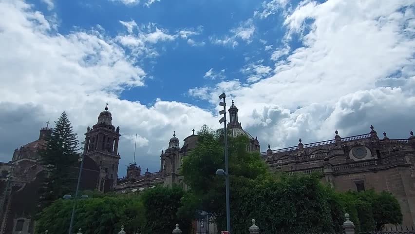 Side view of the Catholic Cathedral of Mexico City, Antiquities, and ancestral historical monuments in the Zócalo of Mexico City