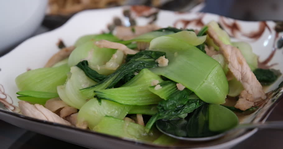 Leeks with meat Ready fried steak with sauce. slow motion