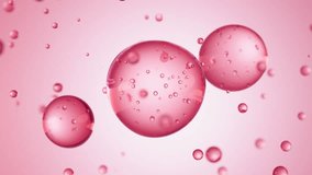 Macro of three drops of red liquid merge into one with bubbles inside. Skin care serum droplets uniting into one. Cosmetics moisturizer fluid concept - Powered by Shutterstock - Get 15% off with code: PIKWIZARD15