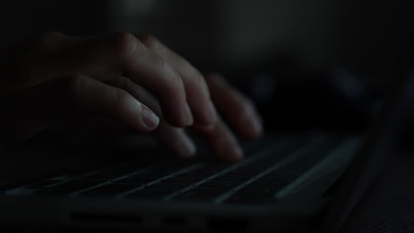 Close-up Female hands typing on a laptop