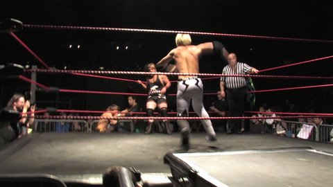 LONDON - April 1: Pro Wrestling Match, Painful Stomp to Abdomen during BritWres-Fest 2012 on April 1, 2012