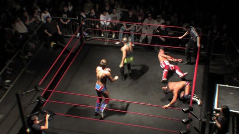 LONDON - April 1: Pro Wrestling Match, Kick to Outside Ring during BritWres-Fest 2012 on April 1, 2012